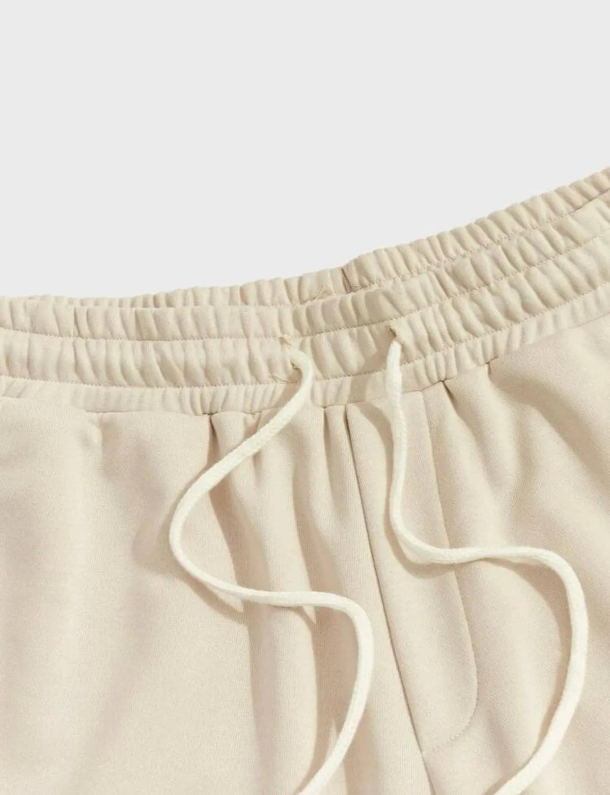 Letter patch detail drawstring waist shorts